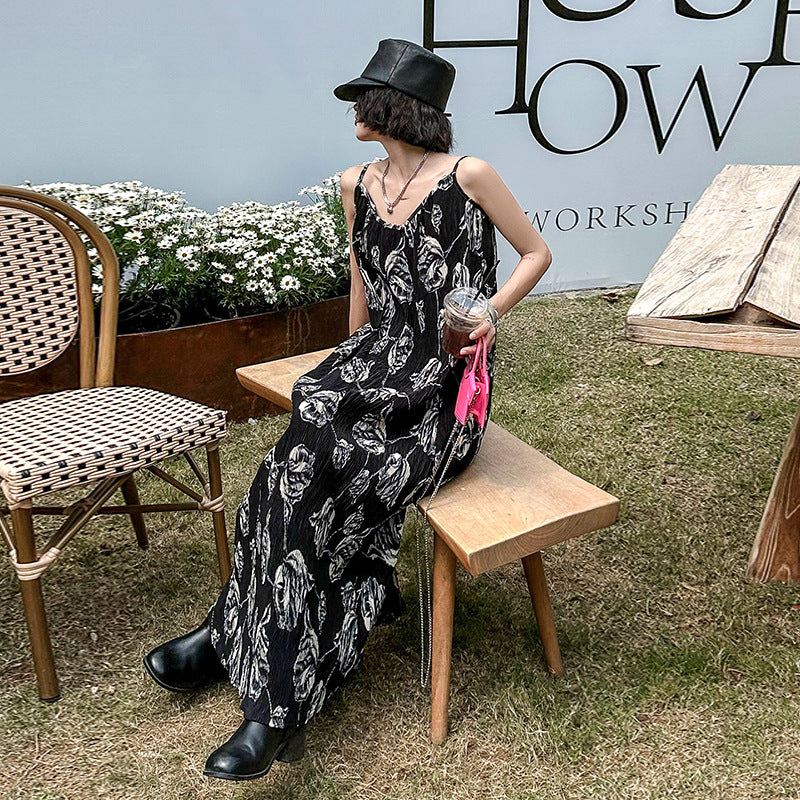 Sleeveless pleated floral onepiece