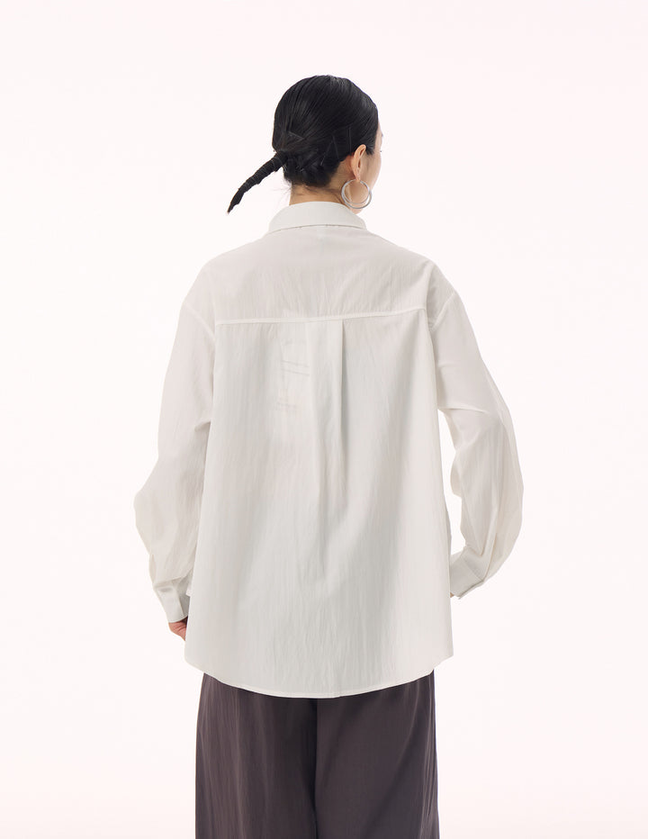 Front tuck loose shirt