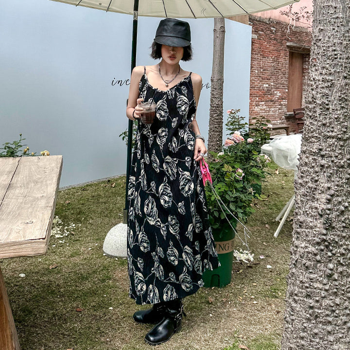 Sleeveless pleated floral onepiece